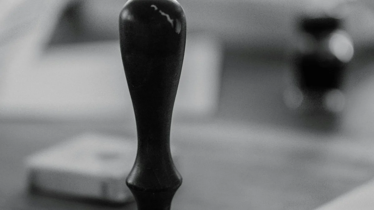 A dark wooden stamp standing on a desk in front of blurred papers. — a The Obsidian Key guide to Eight Beginner Manifestation Mistakes.