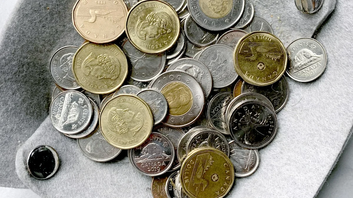 Gold and silver coins scatter across a gray felt cap beside a watch chain. — a The Obsidian Key guide to Get the Obsidian Key: The Money Chapters Inside.