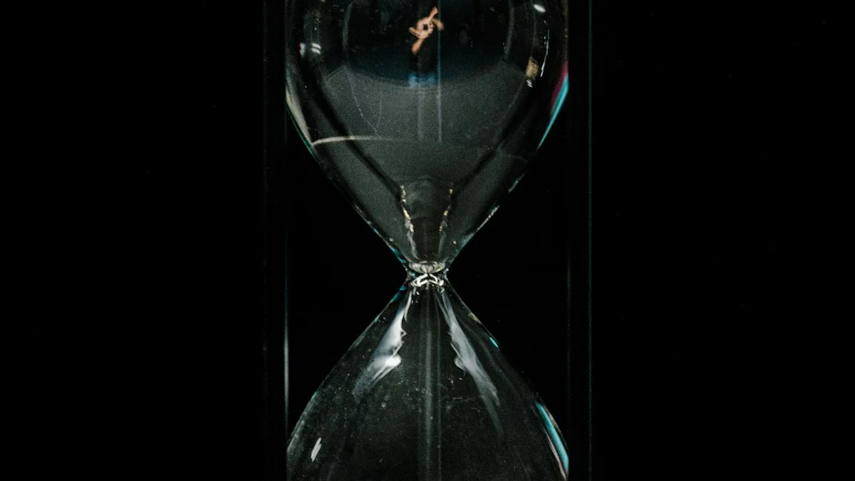 An hourglass with a thin stream of sand stands against a black background. — a The Obsidian Key guide to How Long to Sit: The Eleven-Minute Rule.