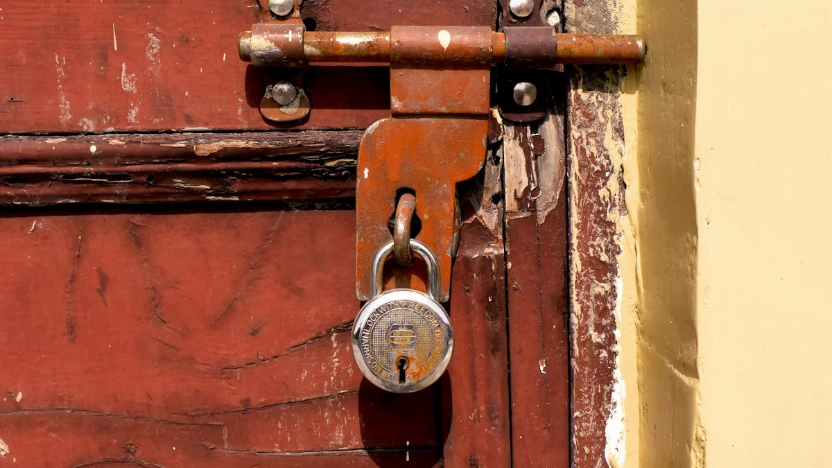 A rusted bolt and padlock hold a weathered red wooden door shut. — a The Obsidian Key guide to How to Say No Without Guilt Per the Architecture.
