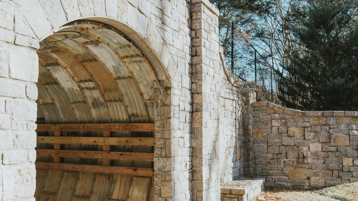 An old stone archway opening onto a dark rounded passage beside a stone wall. — a The Obsidian Key guide to No Students, No Initiations, No Successors: Why It Matters.