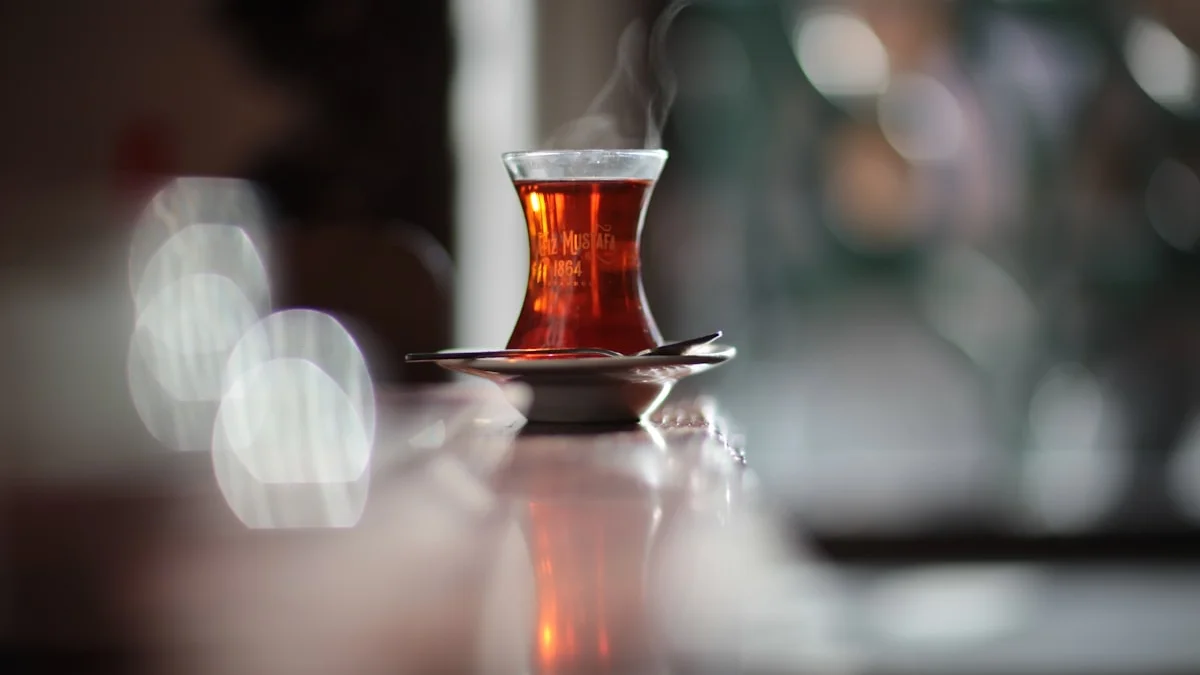 A steaming glass of amber tea on a saucer in a soft-focus reading room. — a The Obsidian Key guide to Seven Mistakes Readers Make With The Obsidian Key.