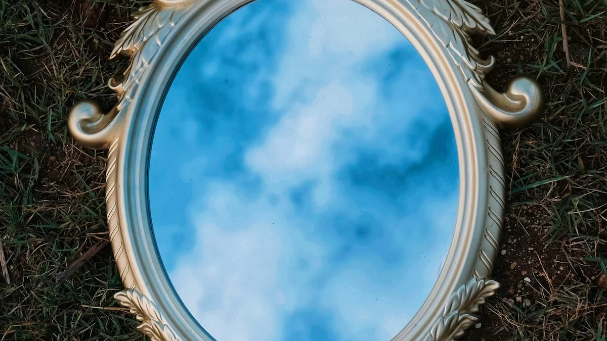 An ornate gold-framed oval mirror lies on dark grass reflecting the sky. — a The Obsidian Key guide to The Obsidian Key Wealth Method Explained.