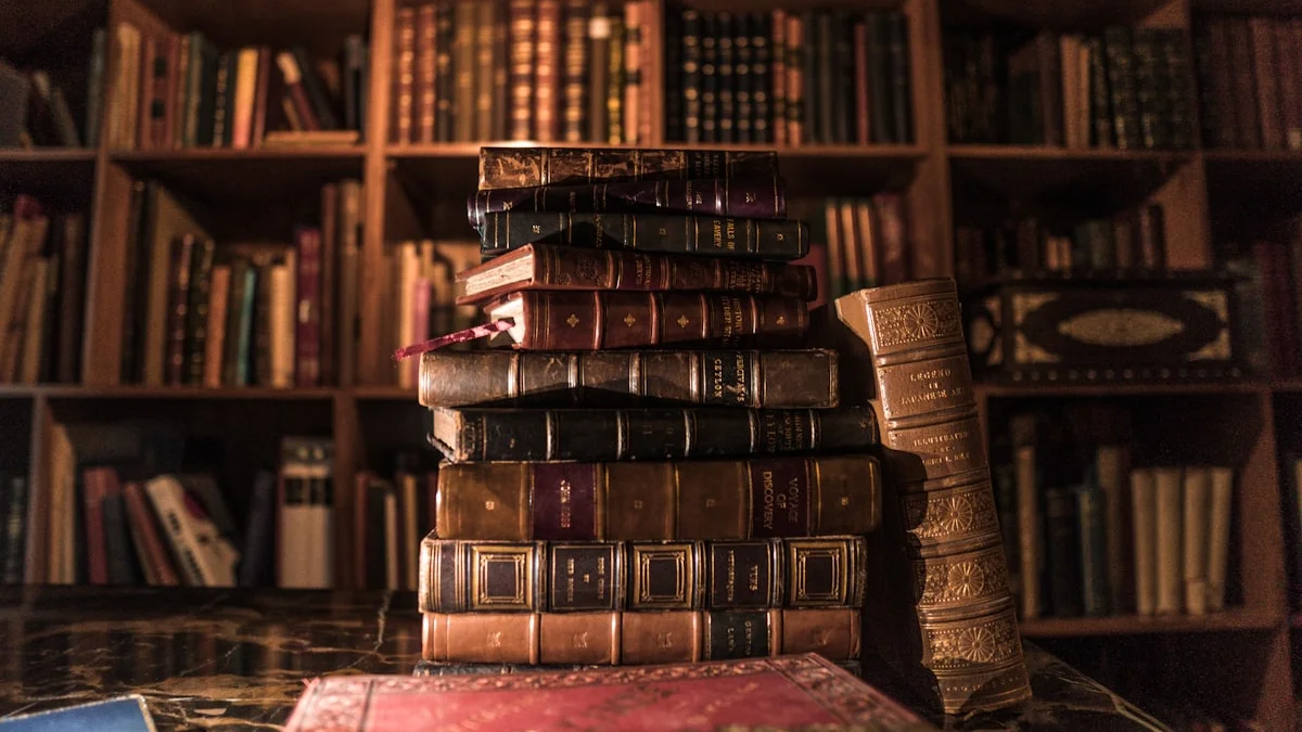 A tall stack of antique leather-bound books on a desk before a warm bookshelf. — a The Obsidian Key guide to Practice-Space Mistakes That Quiet the Work.