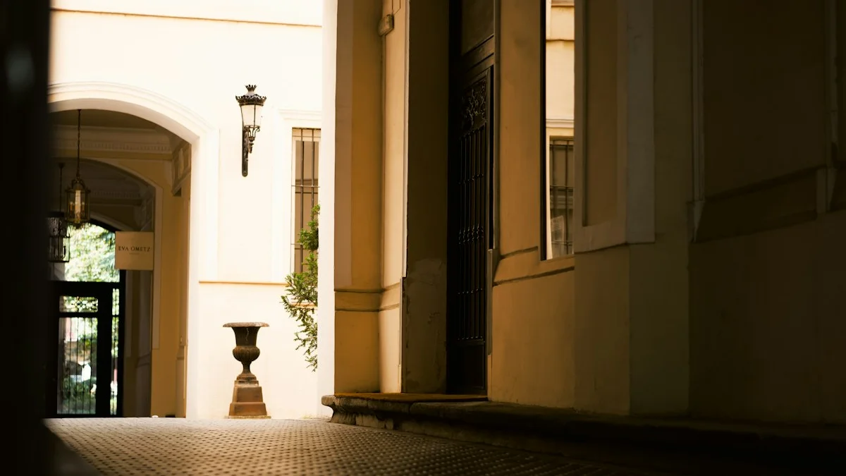 A warm stone corridor rises toward an archway where pale morning light gathers. — a The Obsidian Key guide to Stillness Posture: Chair, Spine, and the Raised Crown.