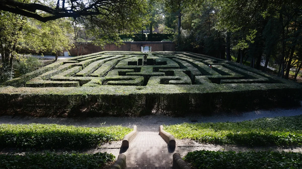 A formal hedge maze seen from above with a brick entry path leading into it. — a The Obsidian Key guide to Get the Thirty-Day Path Week Planner.
